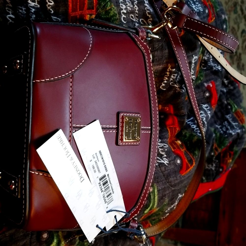 Dooney & Burke mini domed crossbody Brand new with original tags